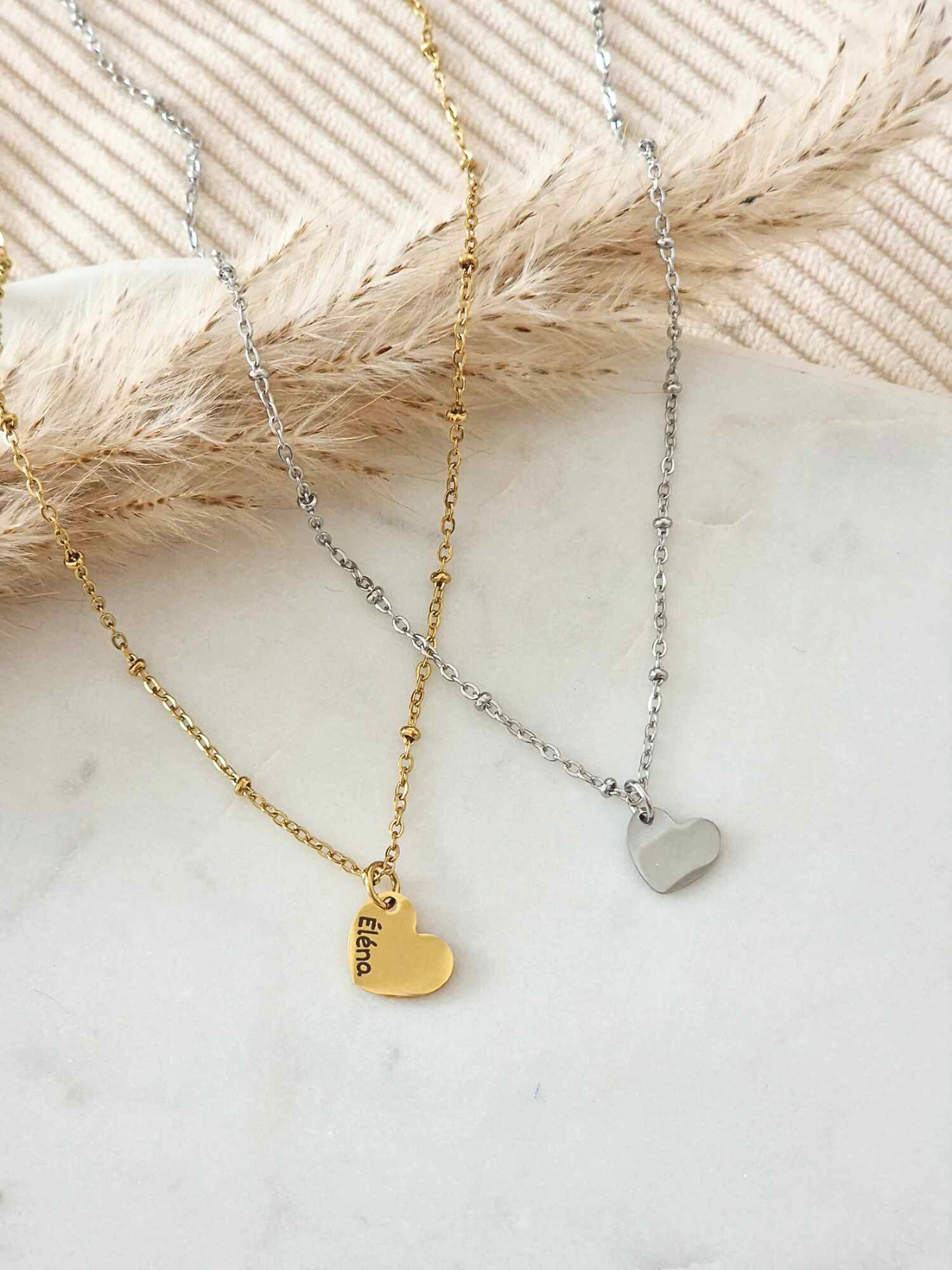 Collier avec médailles en forme de coeur